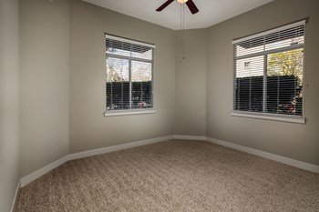 Carpeted bedroom at The Madison at Town Center Apartments in Santa Clarita CA